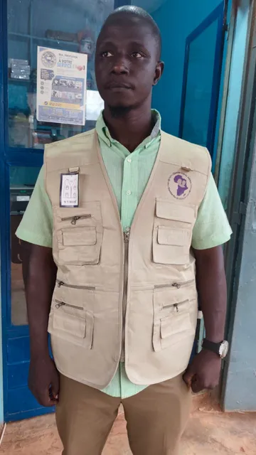 Gilet de travail beige avec logo personnalisé pour Dambe Funds Africa